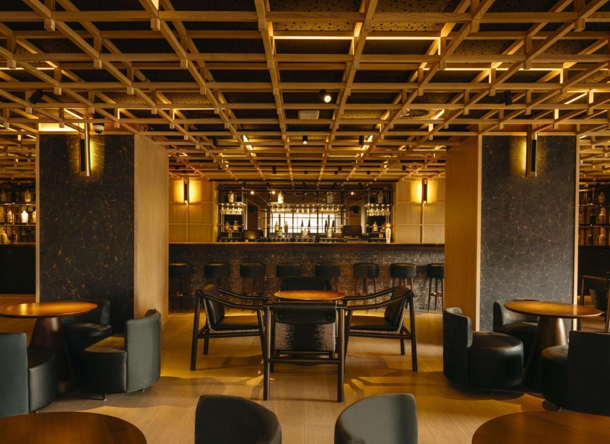 Nobu Hotel Barcelona Exterior foto The interior of the bar